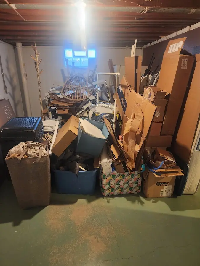 Roll-off dumpster container at job site for 15 Yard Dumpster Rental in Metamora